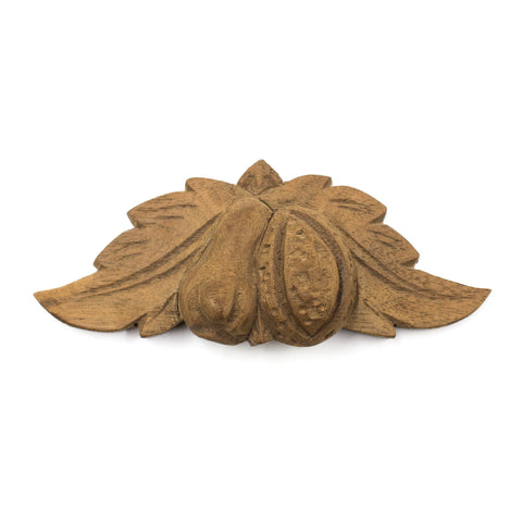 this is an antique vintage carved wood applique for a dresser drawer