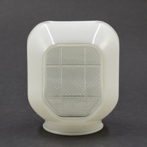 this is a vintage mid century white glass sconce shade with a grid pattern on the front
