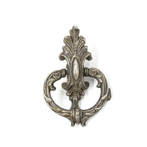 this is an antique pewter colored ring pull featuring a filigree pattern
