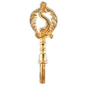 A large key consisting of a square-ended tube for the key, and a very large and ornate handle with a fish-like creature surrounded by designs shaped like cresting waves. The whole thing was originally a brassy gold tone, but you can now clearly see silver-colored metal showing through in many places.