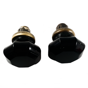 A top-down view of both knobs, showing slight differences in the bases