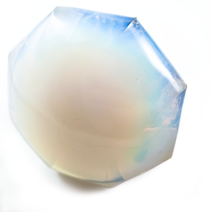 An angled view of the glass, showing the opalescence and some of the dings and scratches