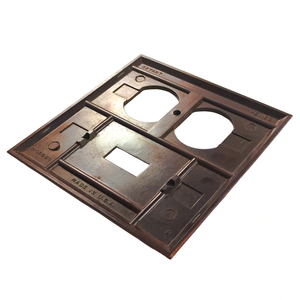 An angled view of the plate, making it easier to read the stamps on the back