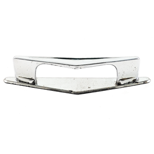 A chevron-shaped chrome-plated drawer handle sitting on a chrome-plated triangular back plate