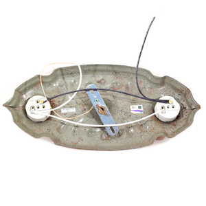 The back of a two-socket ceiling light fixture, which has been coated in grey enamel and rewired to UL standards.