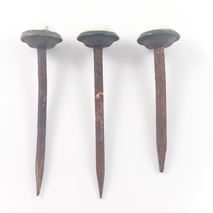 The three nails all in a line, showing that one is shorter than the other two