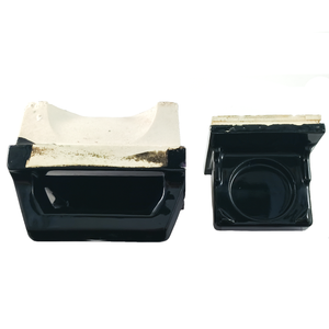 A top-down view of a soap holder with a grab bar and a cup holder, both tile-in styles made of porcelain and glazed in glossy black. From this angle, the cup holder tray is clearly visible, but the soap dish is somewhat obscured.