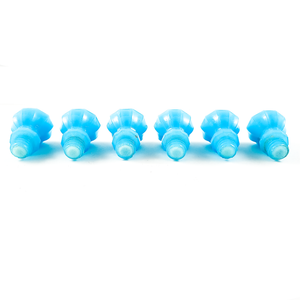 An underside view of the six knobs, showing the bottoms of the threaded bases