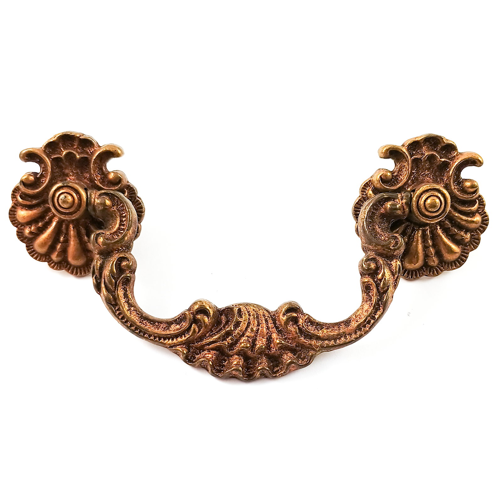 Eight patina-coated brass drawer pulls consisting of two shell-shaped rosettes and a center handle with scroll work and a shell shape in the middle