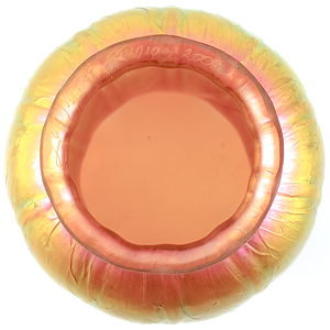 The fitter of a golden glass lamp shade, showing pink and green iridescence and a signature reading "LUNDBERG STUDIOS 2008"