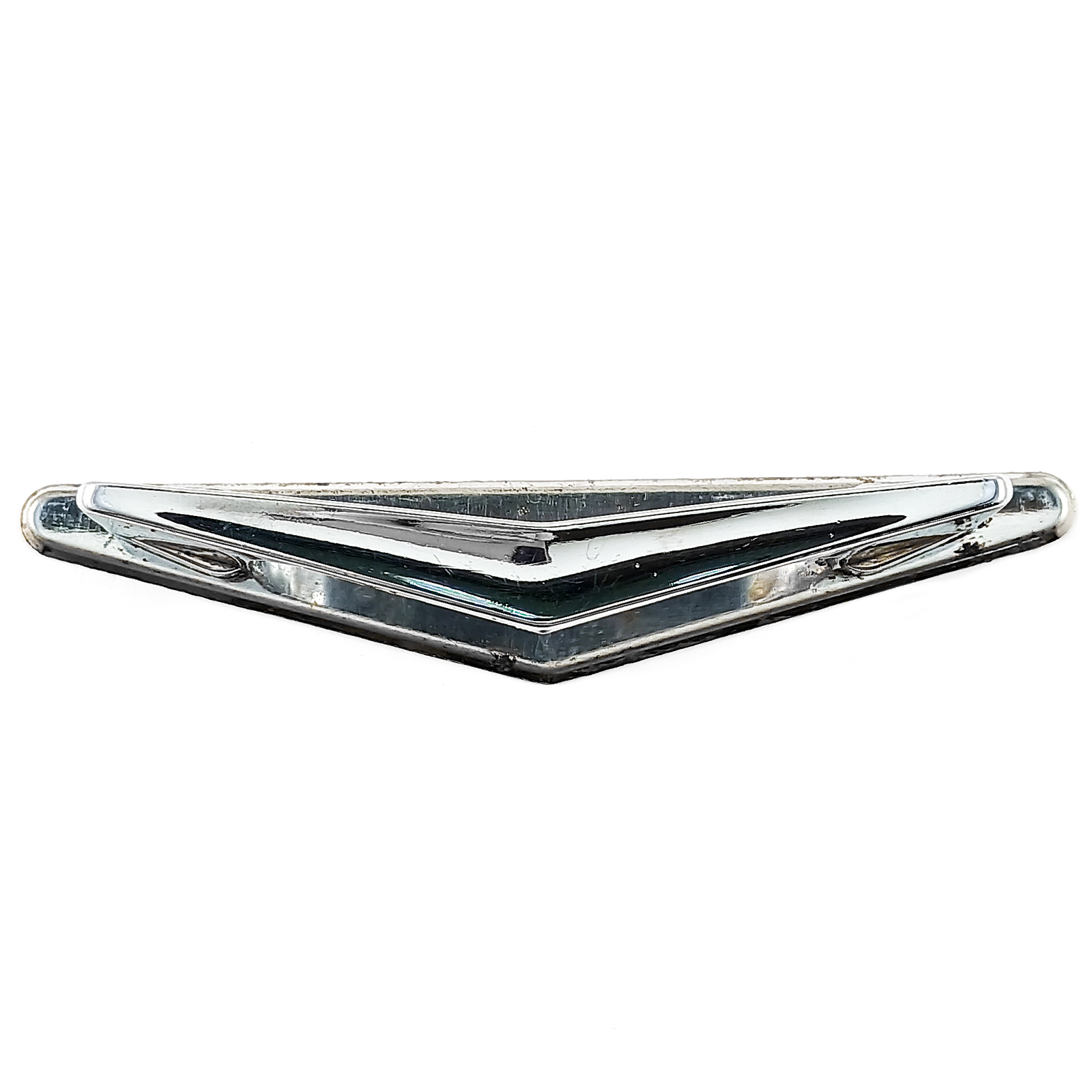 A single chevron-shaped chrome-plated drawer handle on a chrome-plated triangular back plate