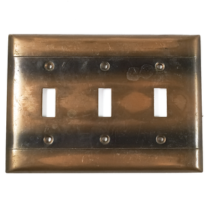 The front of the darker plate, making it easier to see how the stripes of patina blend into the dark finish