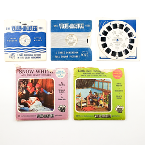 Lot D - Fairytales & Folk Stories. Three reels with sleeves - "The Night Before Christmas," "Rudolph the Red-Nosed Reindeer," and "The Christmas Story" - as well as two sets, "Snow White and the Seven Dwarfs" and "Little Red Riding Hood, Hansel and Gretel, and Jack the Beanstalk," both of which have slightly torn sleeves
