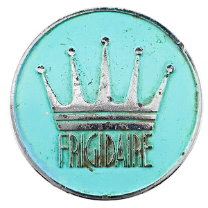 A round turquoise and chrome knob depicting the Frigidaire logo, along with a large five-pointed crown