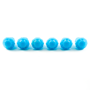 The tops of the knobs, showing that they are ten-sided and have a medium-sized table facet in the middle