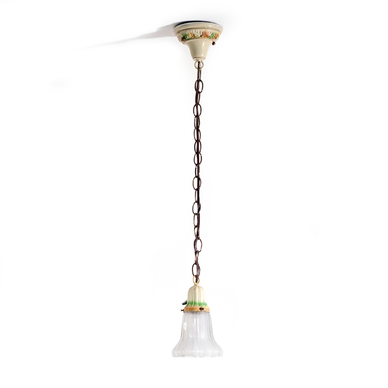 A vintage hanging pendant light with a cream-colored canopy and setting, both of which have hand-painted accents, and a glass tulip shade