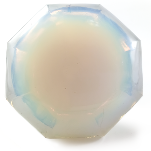 A head-on view of an octagonal, opalescent doorknob. The light shining through it makes zones of blue and orange within the milky, translucent glass.