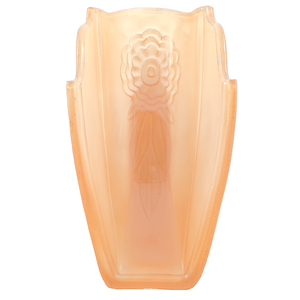 The interior of an amber Art Deco glass slip shade with a molded flower design
