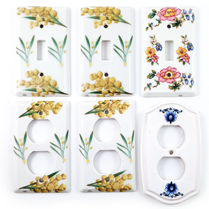Six porcelain light switch plates and double outlet covers, three of each. They are decorated in a variety of floral motifs.