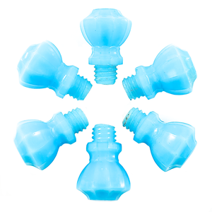 Six fluted light blue glass knobs arranged in a circle, with screw-threaded bases pointing towards the middle