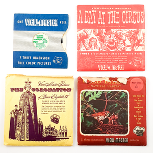 Lot E - Miscellaneous Reels. A sleeved reel labeled "Your Free View-Master 'Fun Parade Reel,'" and three sets - "The Coronation of Queen Elizabeth II," "A Day at the Circus," and "Wild Birds in Natural Habitat." The "Birds" set has some tearing at the top of the sleeve