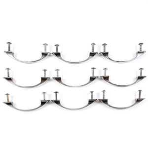 Nine nickel-plated vintage drawer handles with mounting screws arranged in three rows, photographed from the side