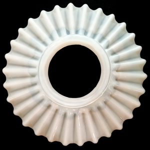 A round, ruffled petticoat shade made of white opalescent glass, photographed on a black background to show that the center is slightly more translucent