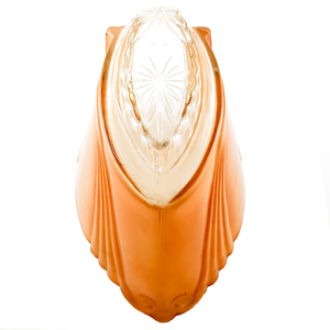 An orange glass slip shade with swirling designs, a partly scalloped edge, and a clear portion with a starburst design pressed into it