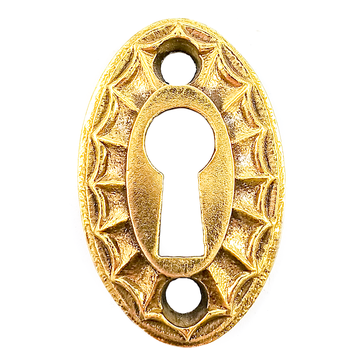 A vintage brass oval keyhole escutcheon, with a raised ray pattern resembling a sunburst or spiderweb