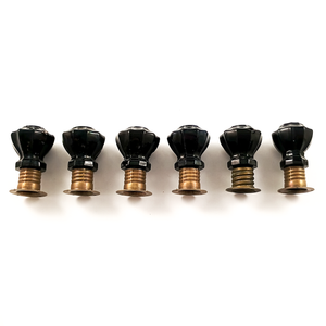 A low-angle side view of the knobs, showing the undersides of the cleats.