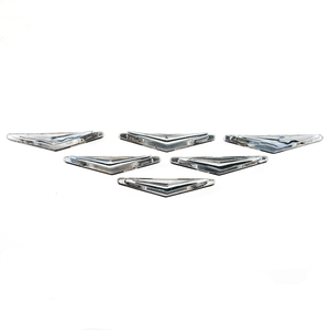 Six chevron-shaped drawer handles arranged in a triangle, each with a triangular back plate behind them