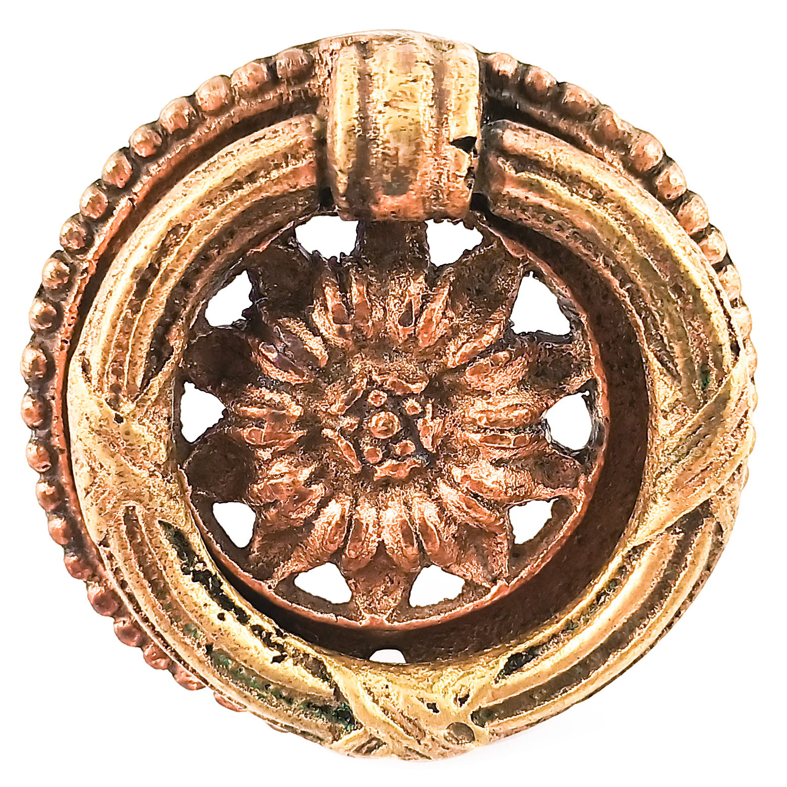 An ornately-decorated vintage brass ring pull with a sunflower design in the middle.