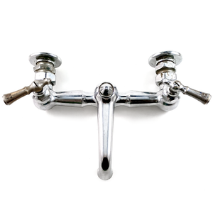A top-down view of a chrome-finish farmhouse Wolverine mixer faucet from the 1930s, with a 5" spout and lever handles