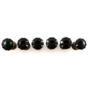 A top-down view of the knobs lined up in a row