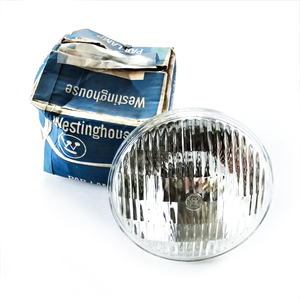 A Westinghouse par lamp next to its original packaging, a blue box with the Westinghouse logo on it
