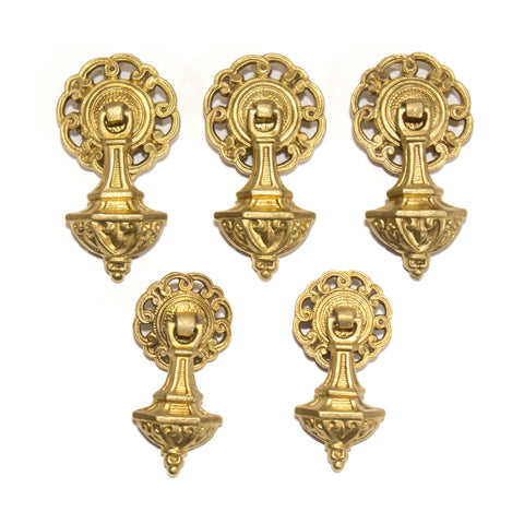 this is a set of antique colonial drop pulls in two sizes