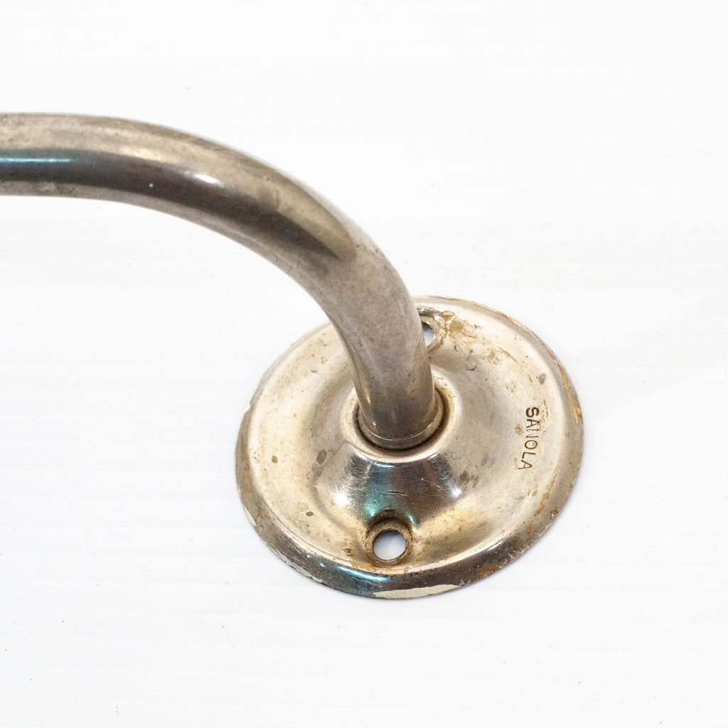 this is a close up picture of a vintage san o la nickel towel bar