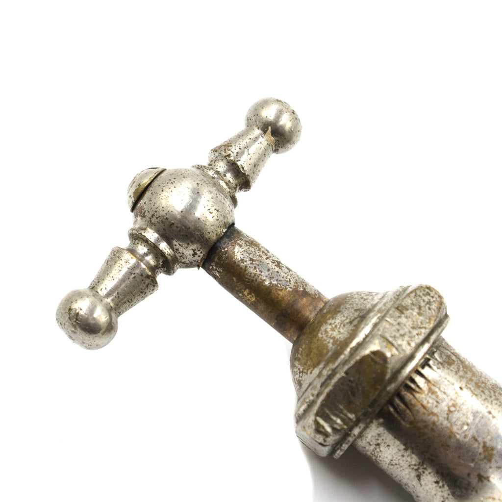 this is an up close picture of the handle on an antique vintage straight stop