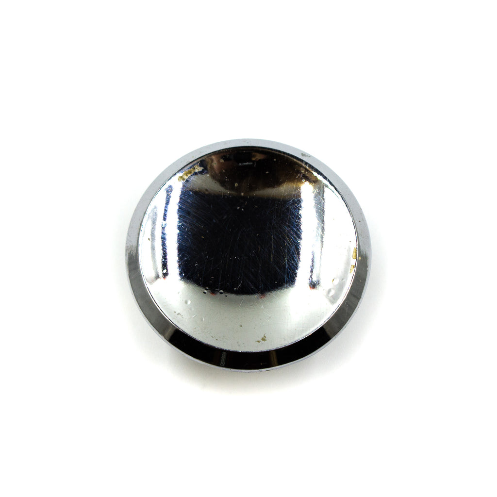 this is the top down view of a vintage mid century shiny chrome colored cabinet or drawer pull knob