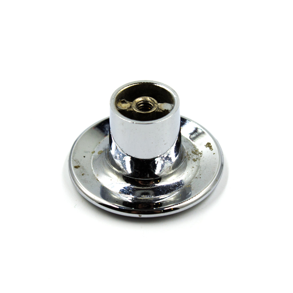 this is bottom view of a vintage mid century chrome colored cabinet or drawer pull knob