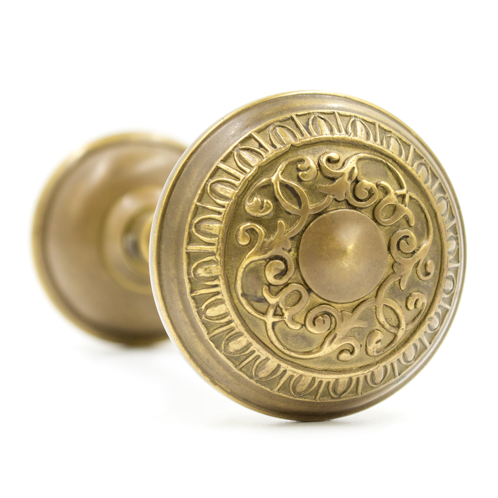 this is an angled picture of a reproduction brass door knob