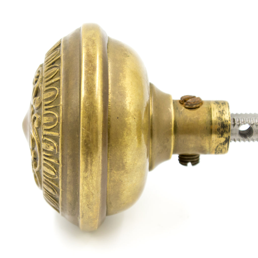 this is a profile picture of a brass door knob