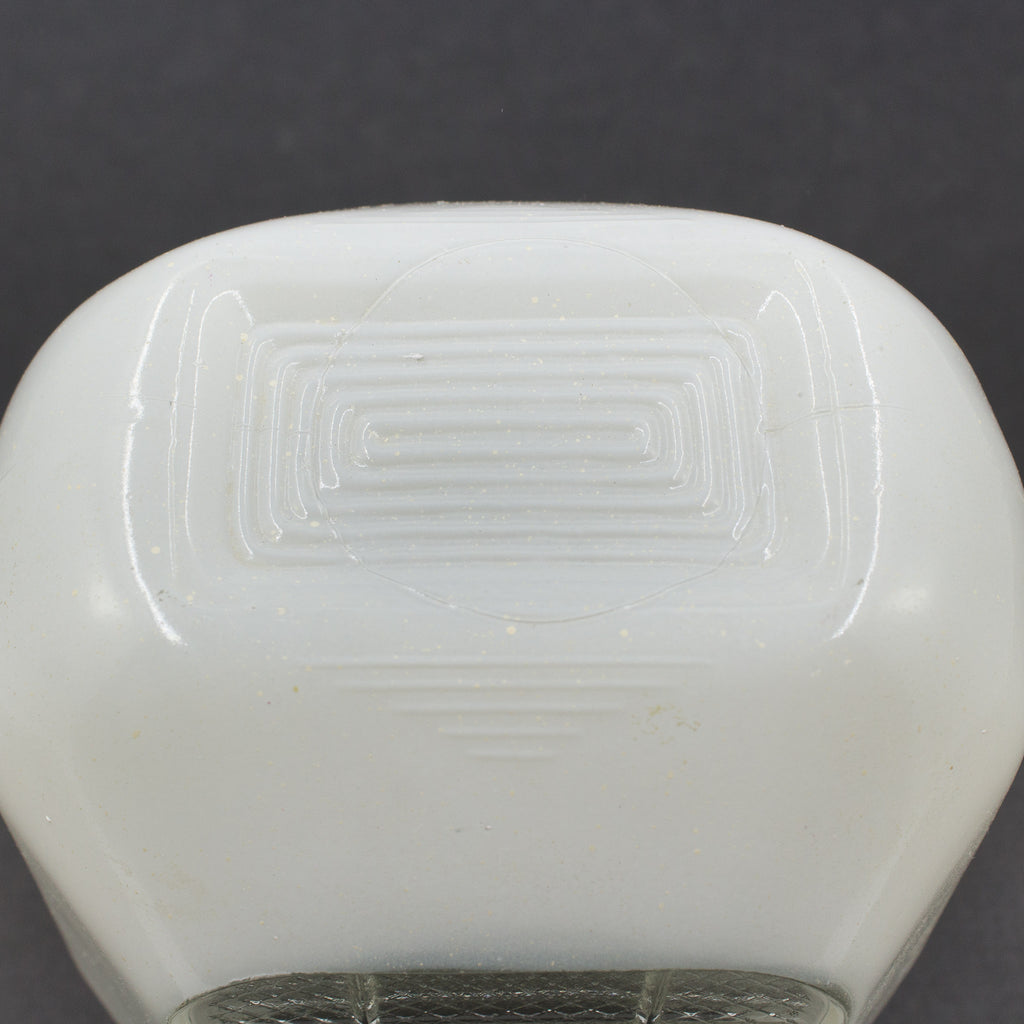 this is a picture of the top of a vintage mid century white glass sconce shade