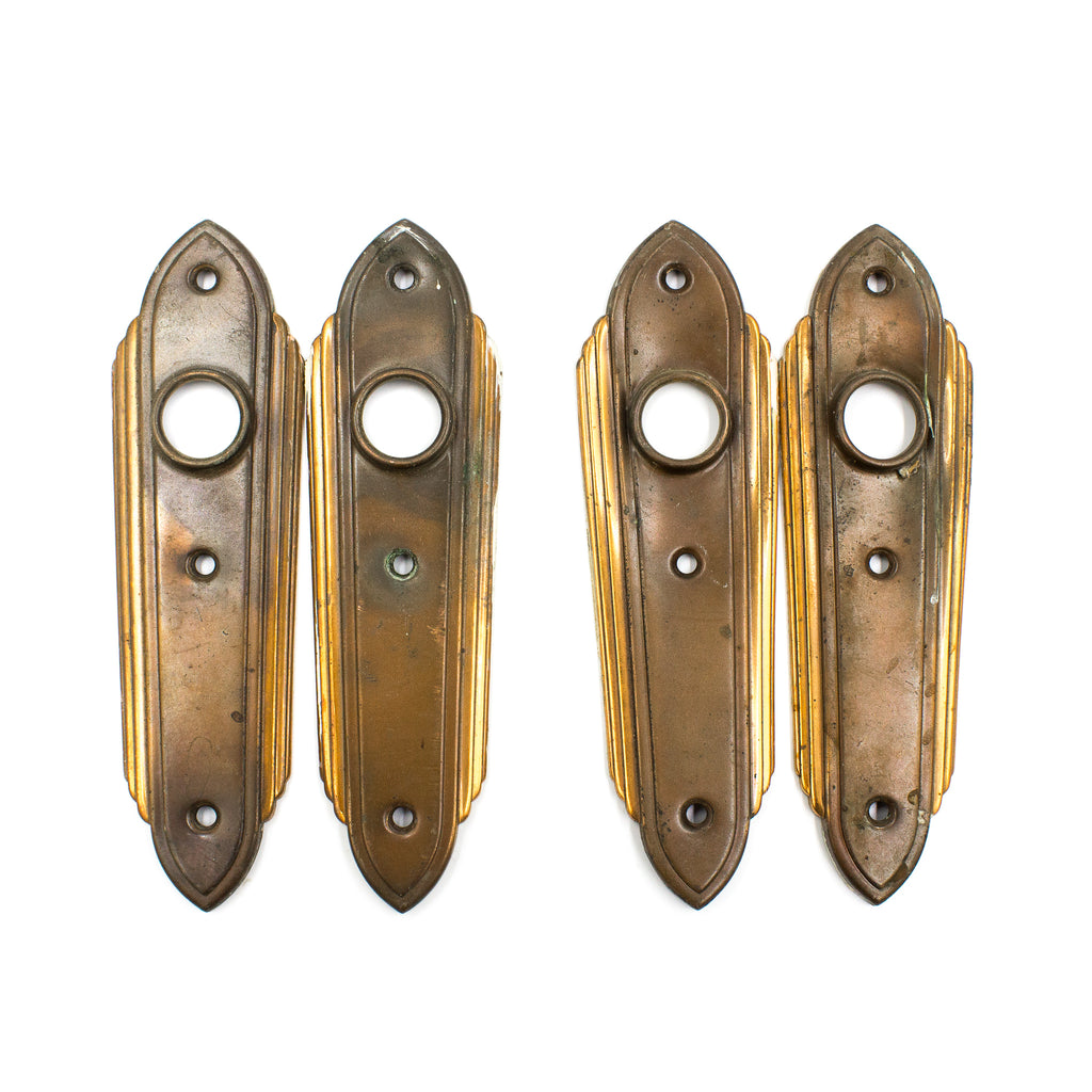 this is two pairs of two vintage mid century art deco escutcheons