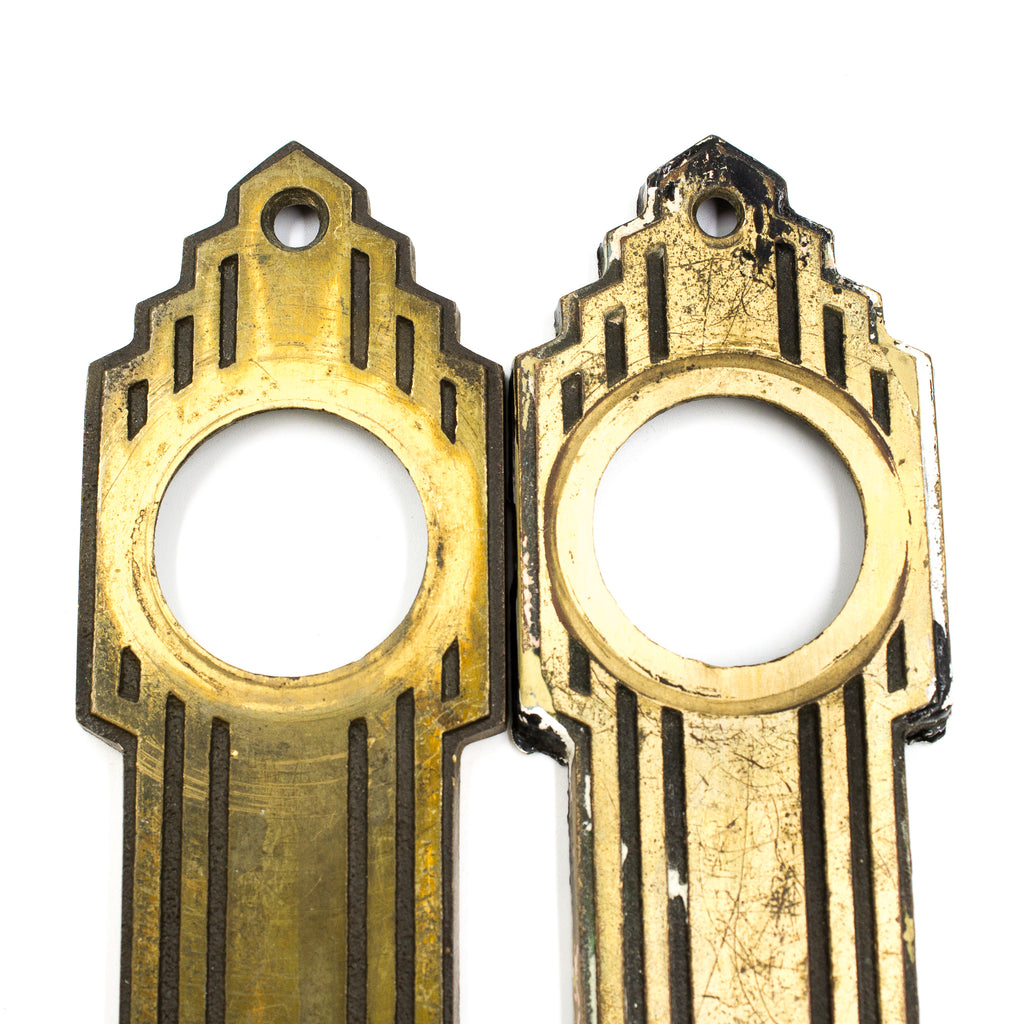 this is a picture of the top part of a pair of vintage mid century art deco escutcheons