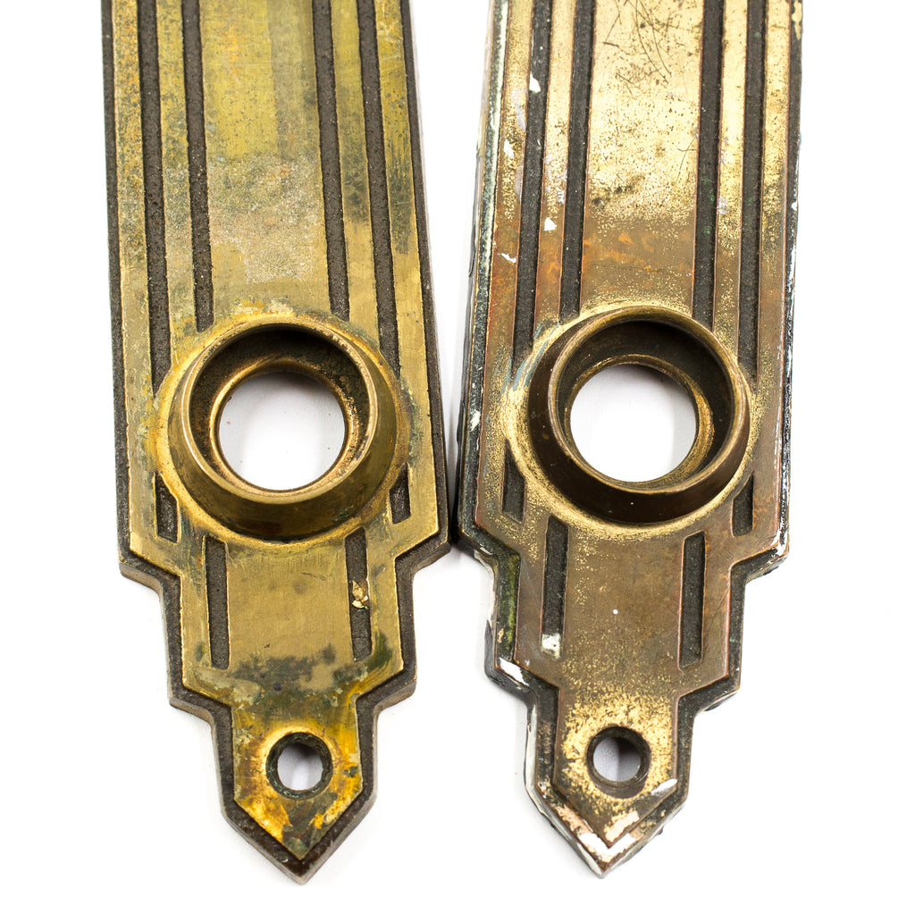 this is a picture of the bottom half of a pair of vintage mid century art deco escutcheons with stripes