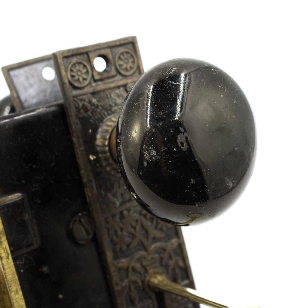 this is a close up picture of an antique vintage black victorian door knob