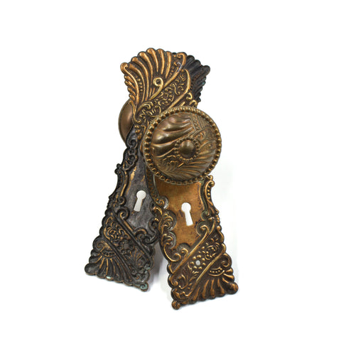 roanoke pattern vintage door knob set with escutcheons