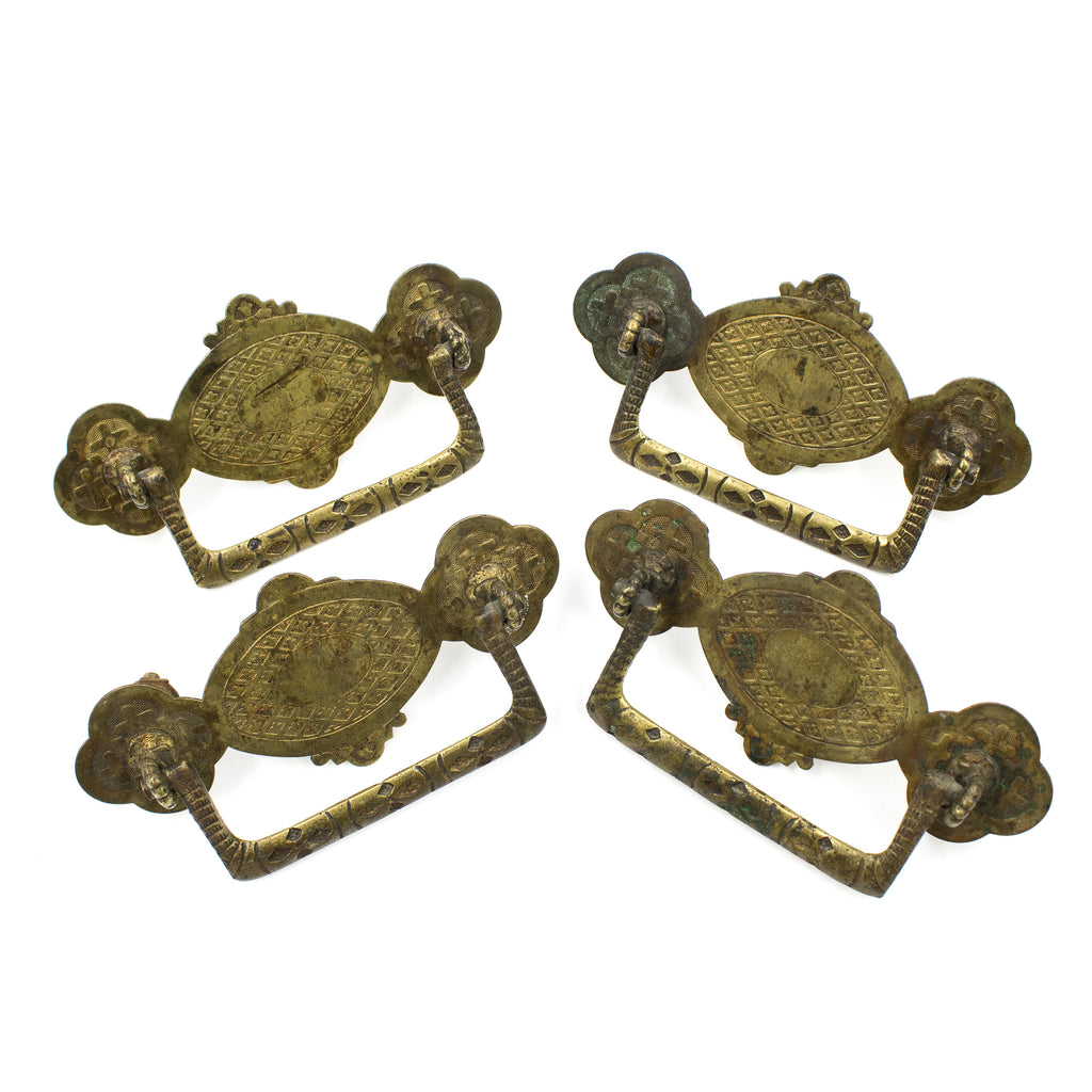 this is a set of four antique brass bail pulls