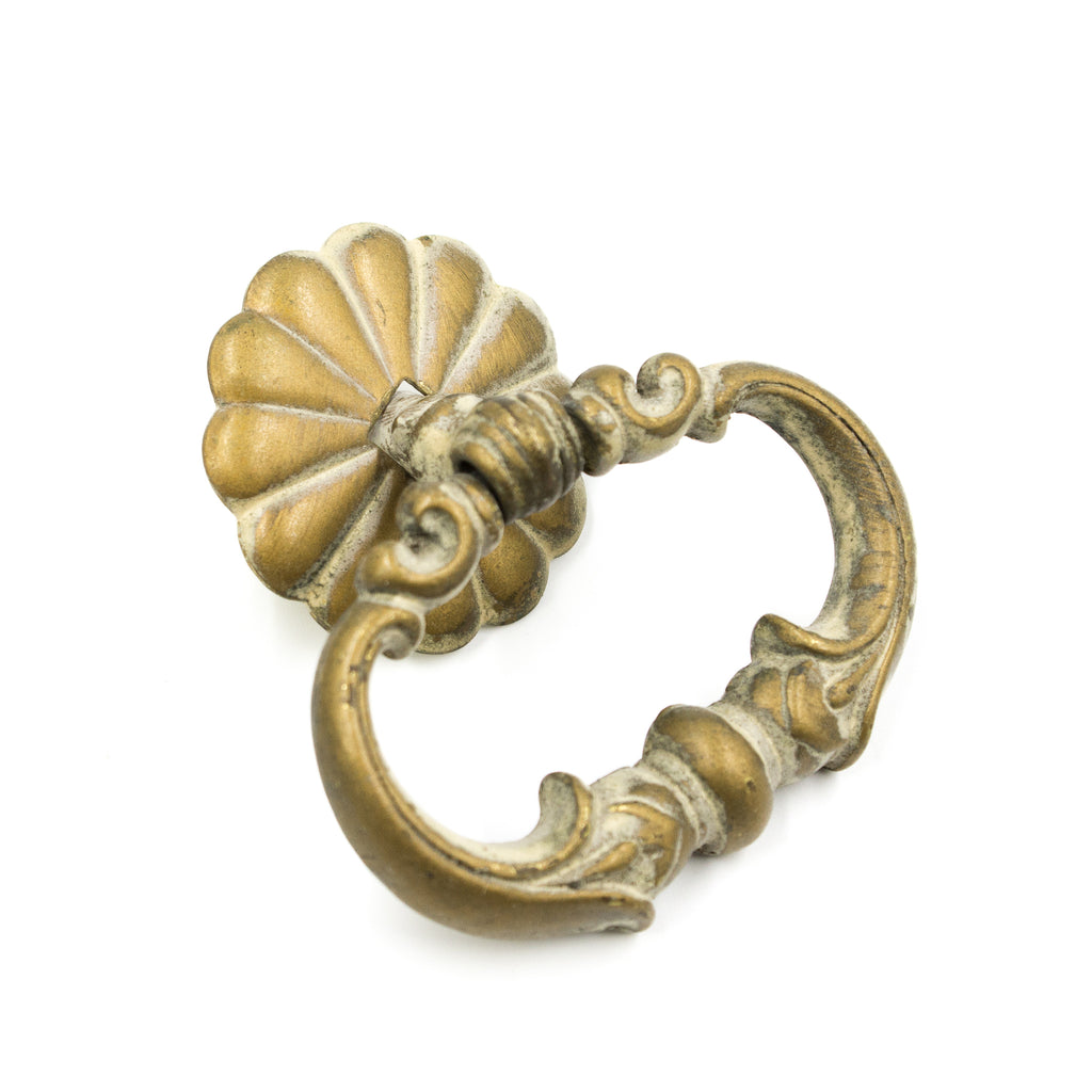 this is a side view of an antique victorian bronze ring pull
